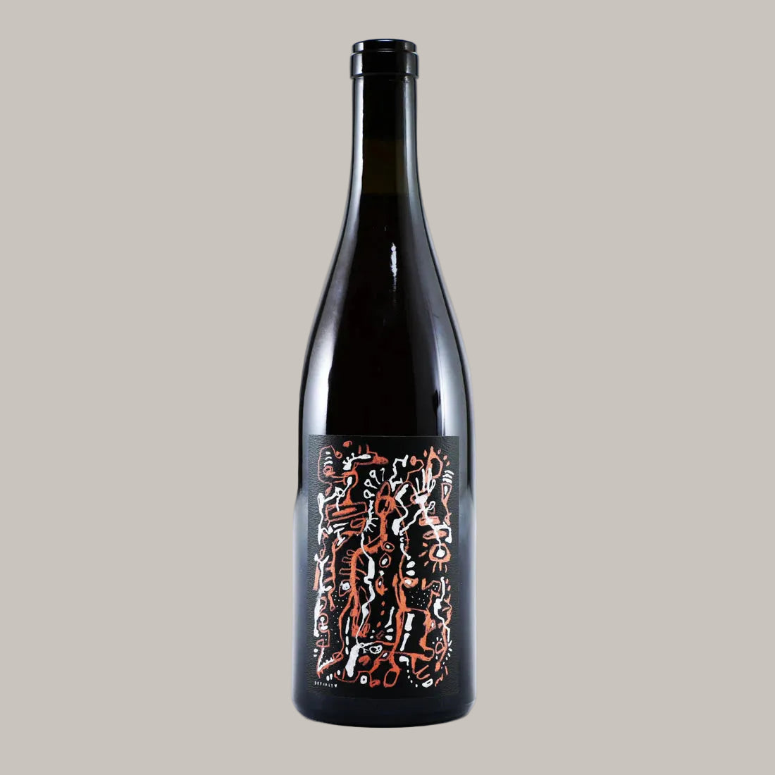 A dark glass bottle of sake with a black label featuring an intricate abstract pattern in orange, white, and black, set against a plain white background.