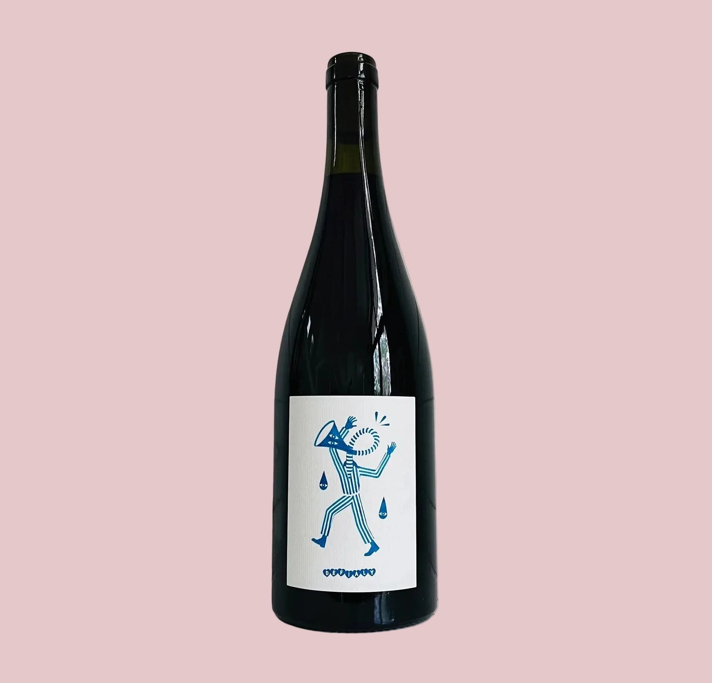 Wine bottle with a label featuring a blue graphic on a white wooden background