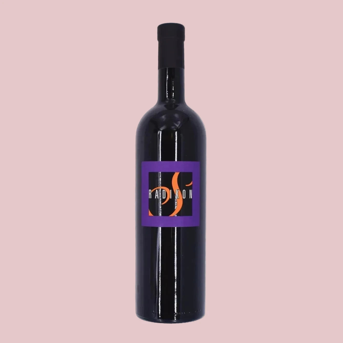 Wine bottle with a purple label on a beige background