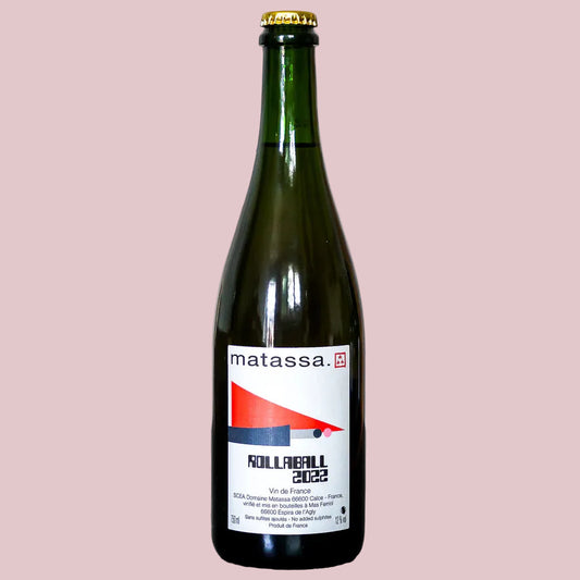 Wine bottle with 'matassa' label on a pink background