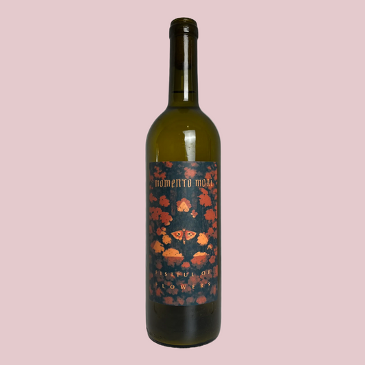 A bottle of white wine with a dark olive-green glass body, featuring a dark label decorated with orange flowers and a butterfly, on a solid gray background.